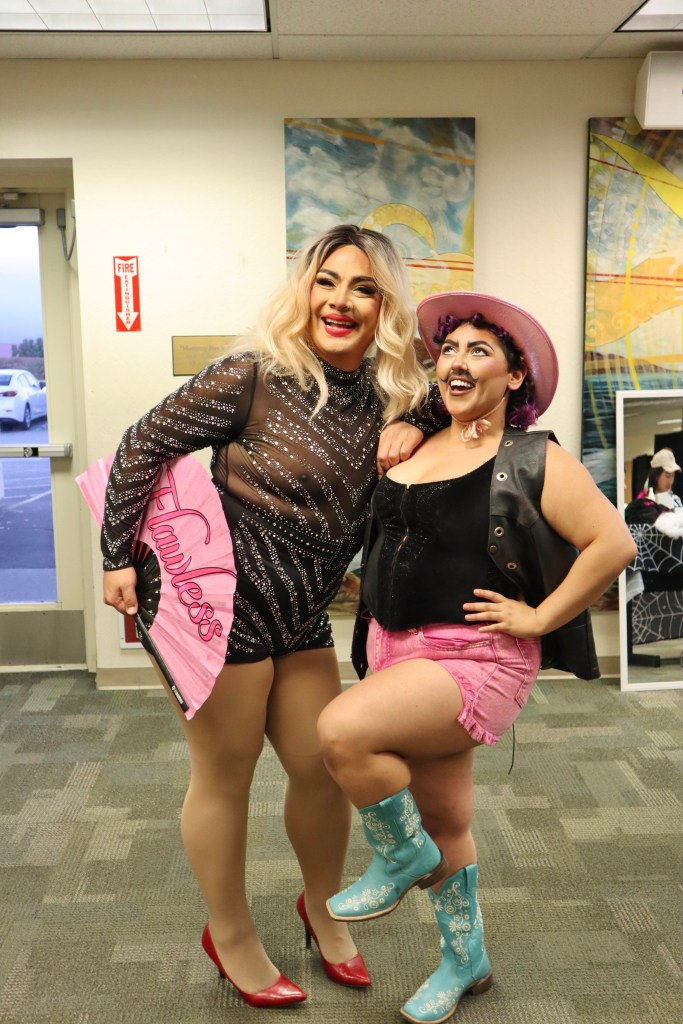 Photo of delight and Xinistra posing for the camera.