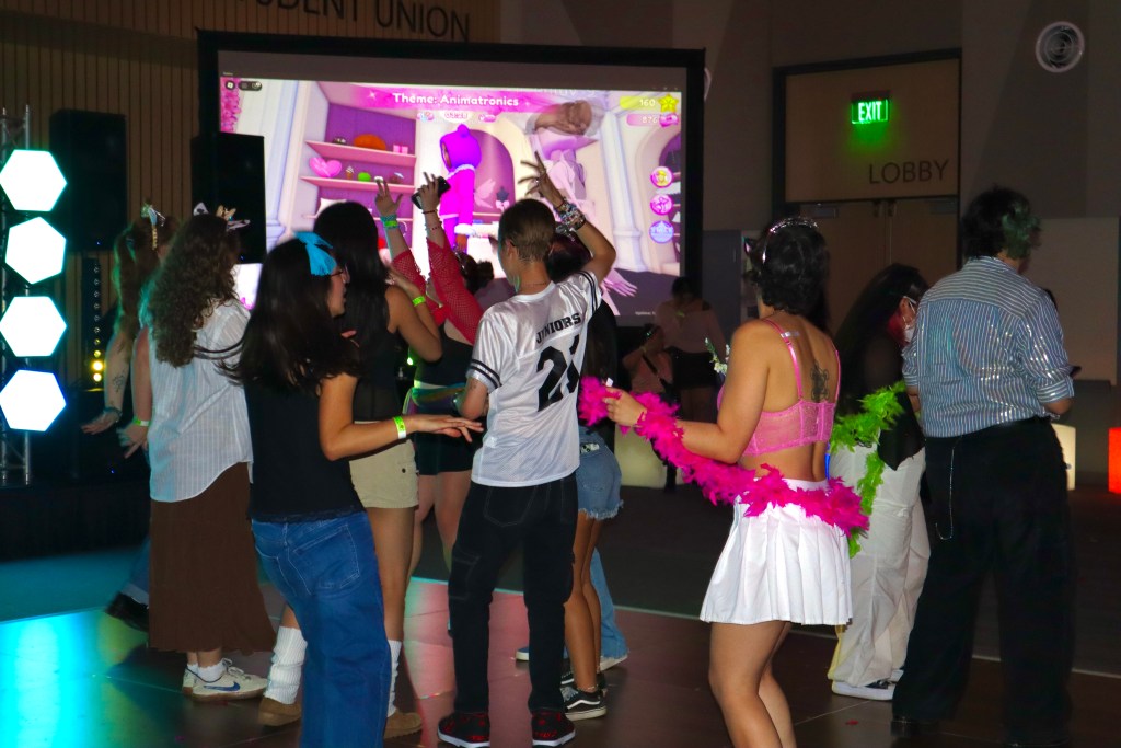 picture of students dancing in a crowd