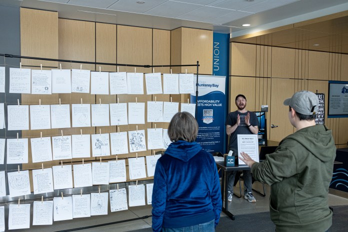 Photo of a wall of hung up papers