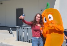 Carrot Guy delivers prizes and merch